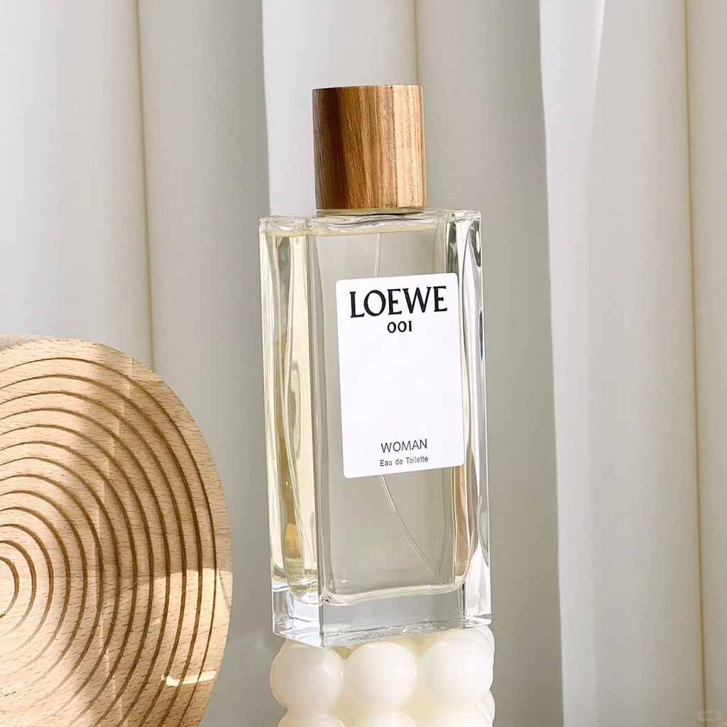 【ของแท้✓ติดทนนาน】 001 Woman EDT 2ml / 5ml / 10ml น้ำหอมยอดนิยม น้ําหอมผู้หญิง น้ำหอมแฟชั่น น้ำหอมมินิ กลิ่นติดทนนาน น้ำหอมพกพา